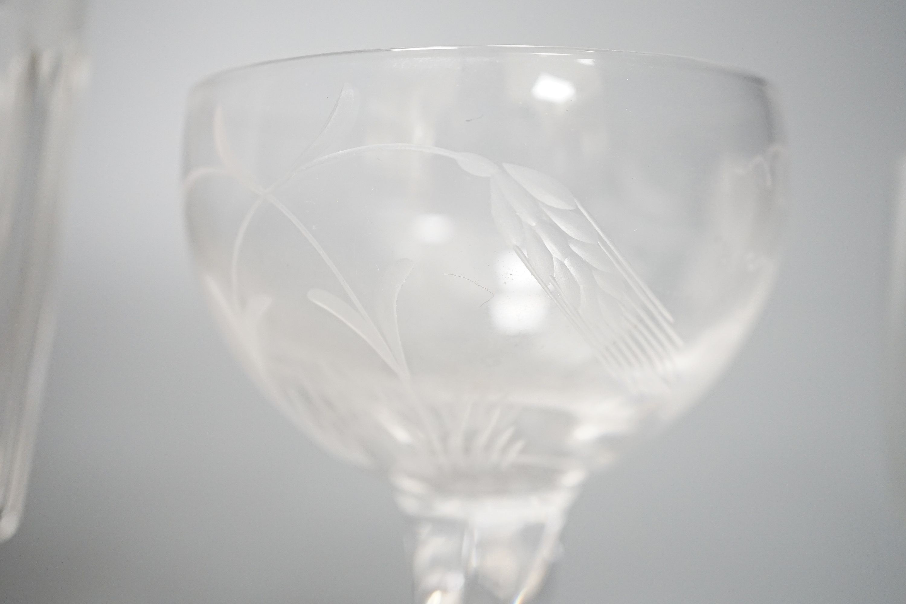 A collection of various suites of 20th century glassware to include a large etched glass